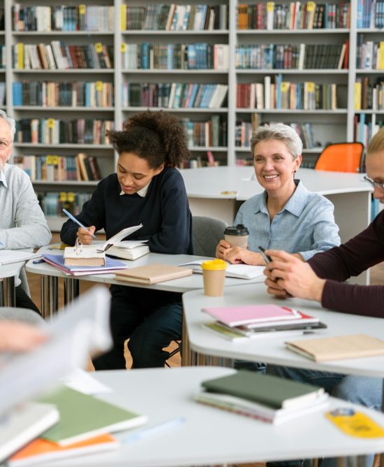 researchers discussing in library 1200px